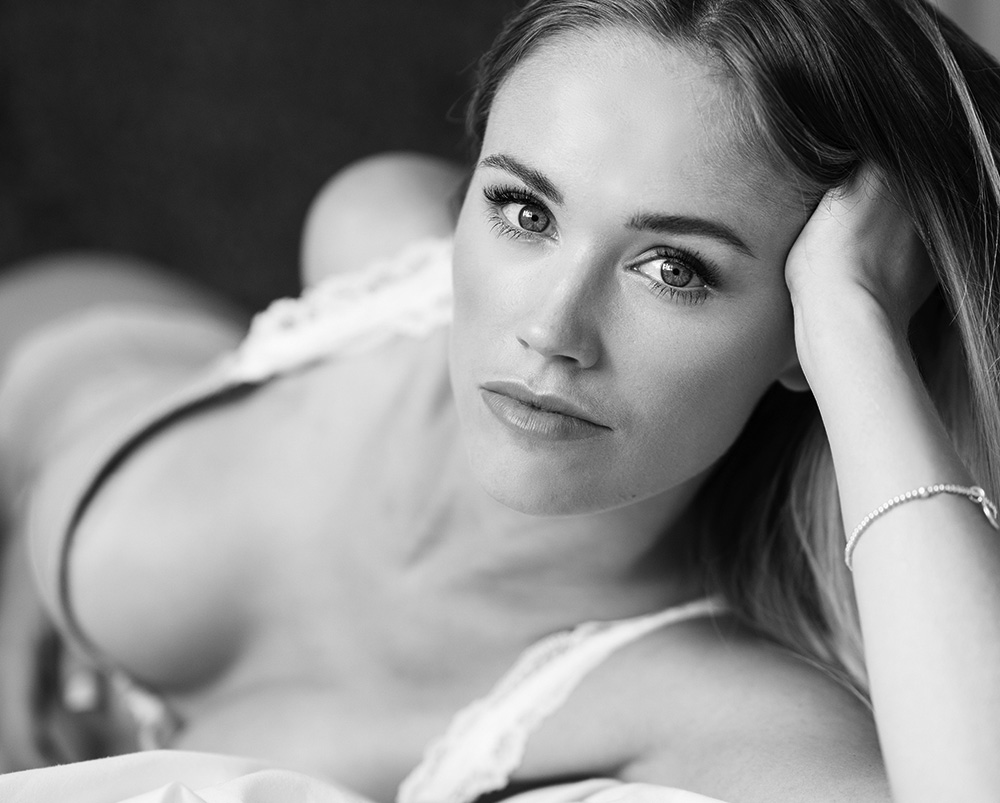 beautiful girl in lingerie staring at camera
